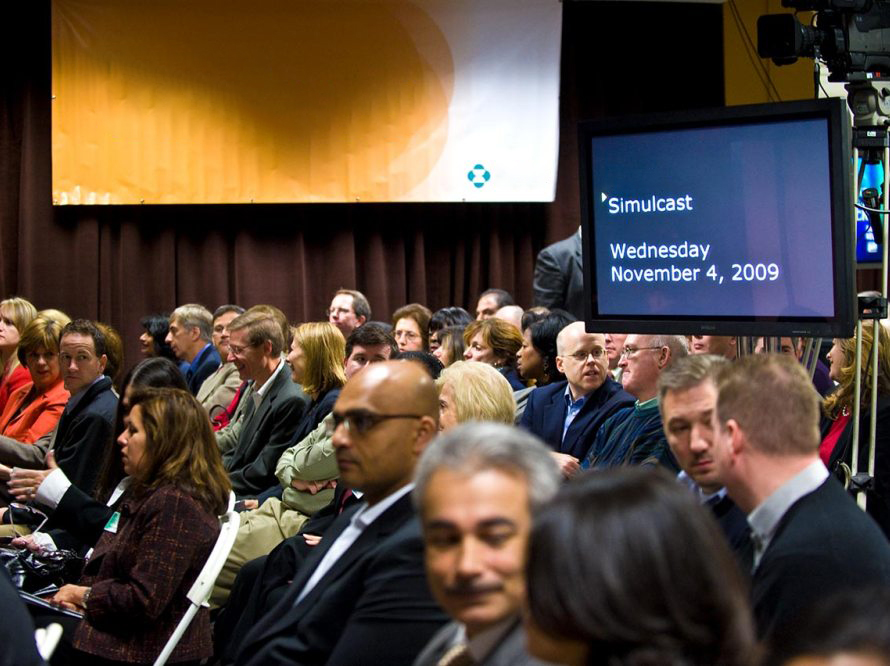 Shareholders attend merger meeting