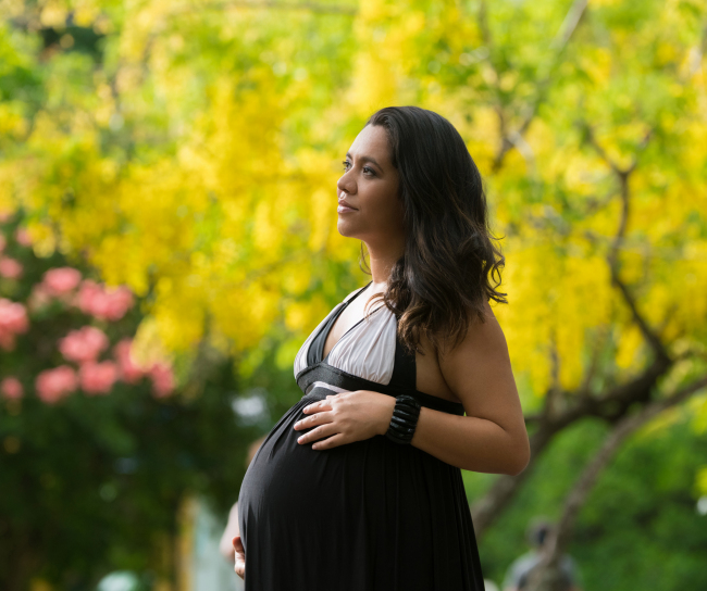 Pregnant woman in the garden