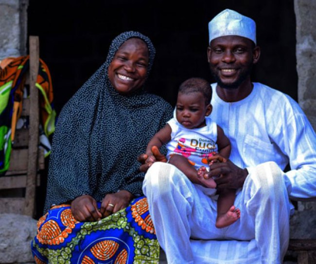 happy couple with their baby