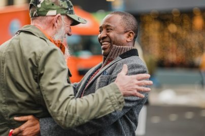 Two people smiling