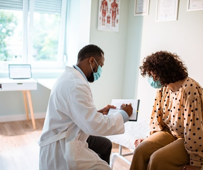 Doctor works with patient
