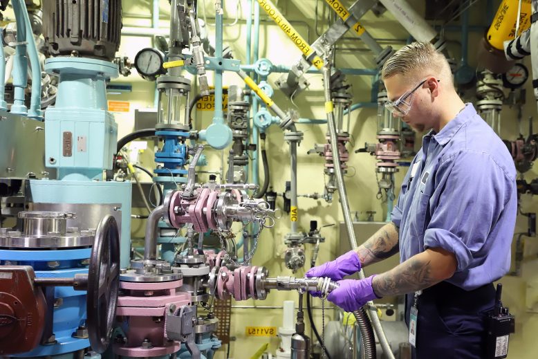 Individual working in industrial lab