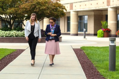 Dr. Gursul Aktan and Claire Mulhearn walking