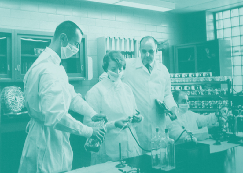 Dr. Hilleman and colleagues at work