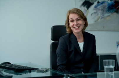 Susi Fiedler sitting at desk