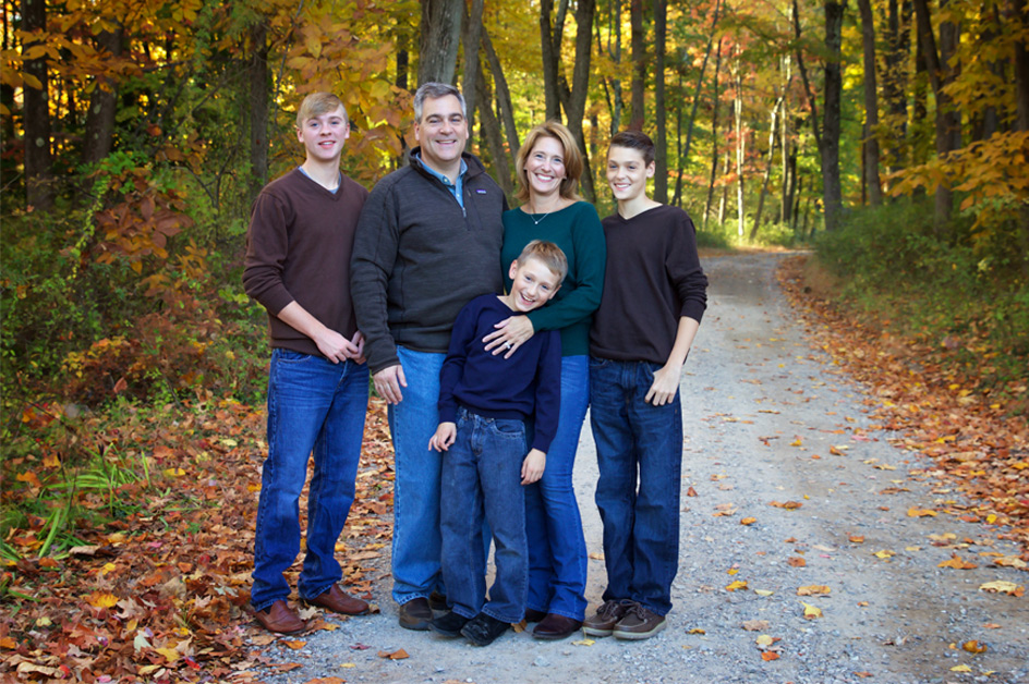 Geralyn Ritter with family in forest