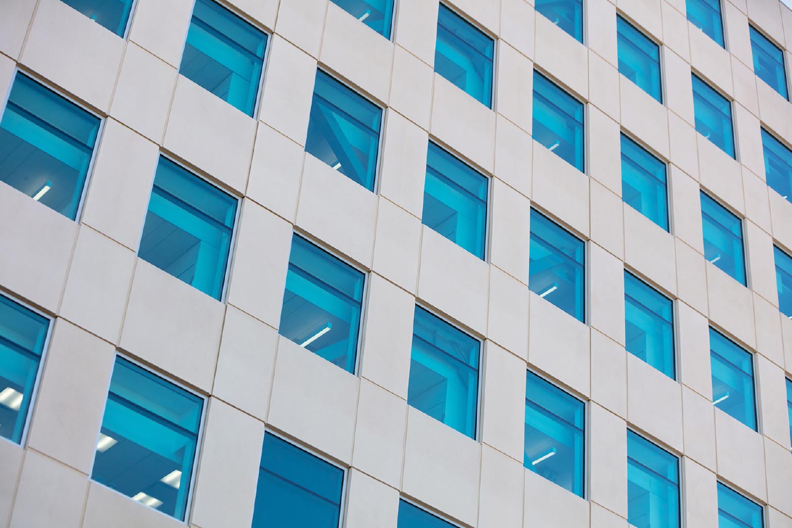Outside of corporate building with blue windows