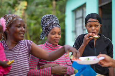 Three African women enjoying food together
