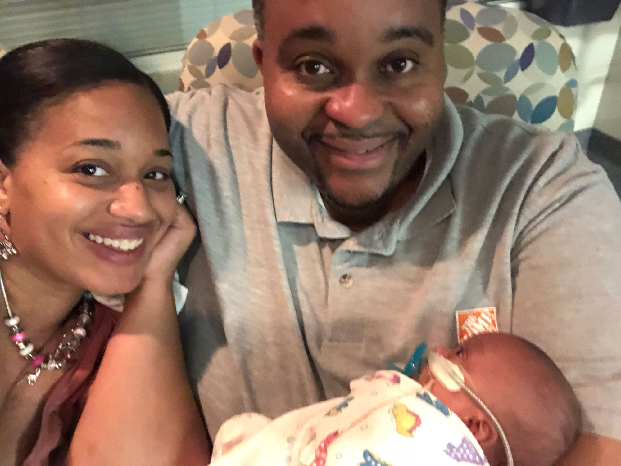 Keelee Moseley with husband and baby