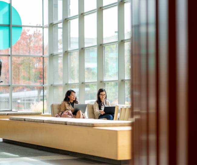 Employees sitting in lobby