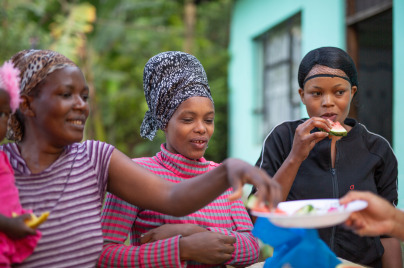 Women eating watermelon