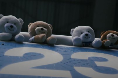 Teddy bears at a soccer match