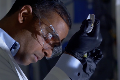 Gokul Swaminathan conducting tests with micro-organisms