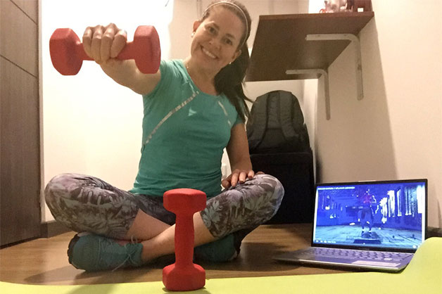 Woman doing a workout online