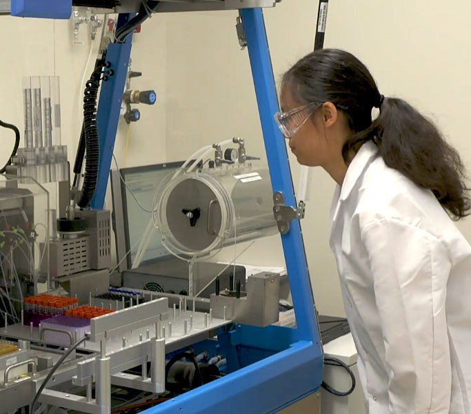 A scientist working in the lab