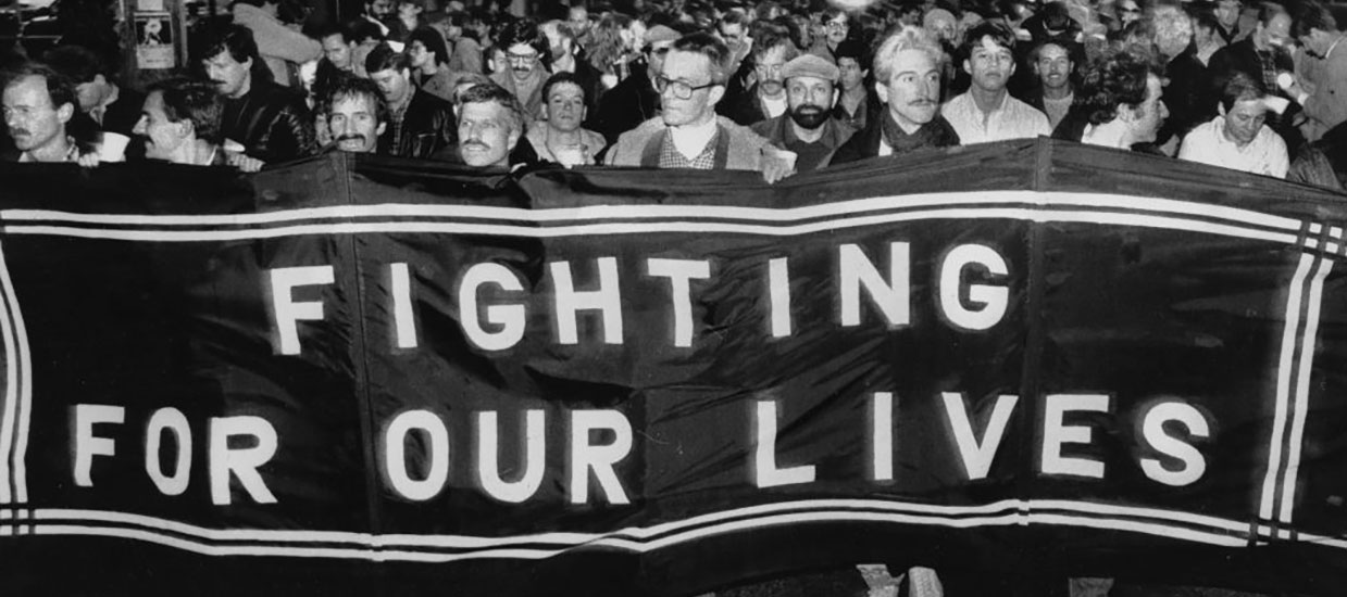 People marching with a fighting for our lives banner