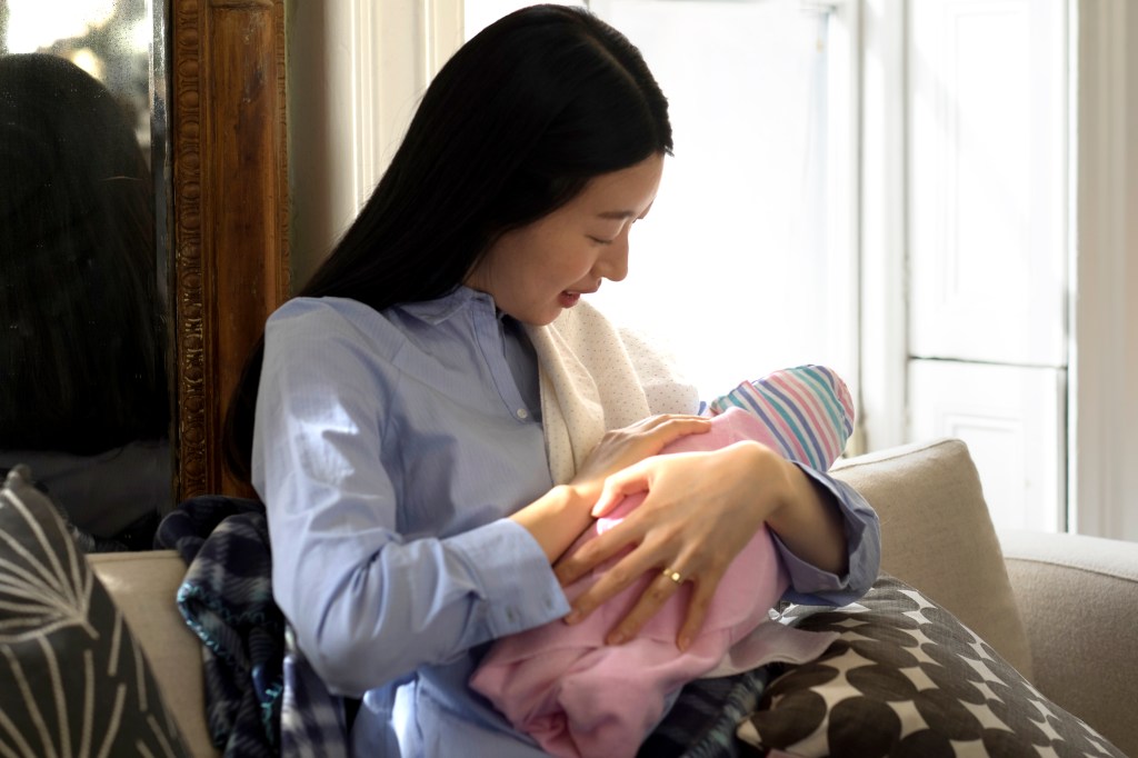 mother holding her new baby