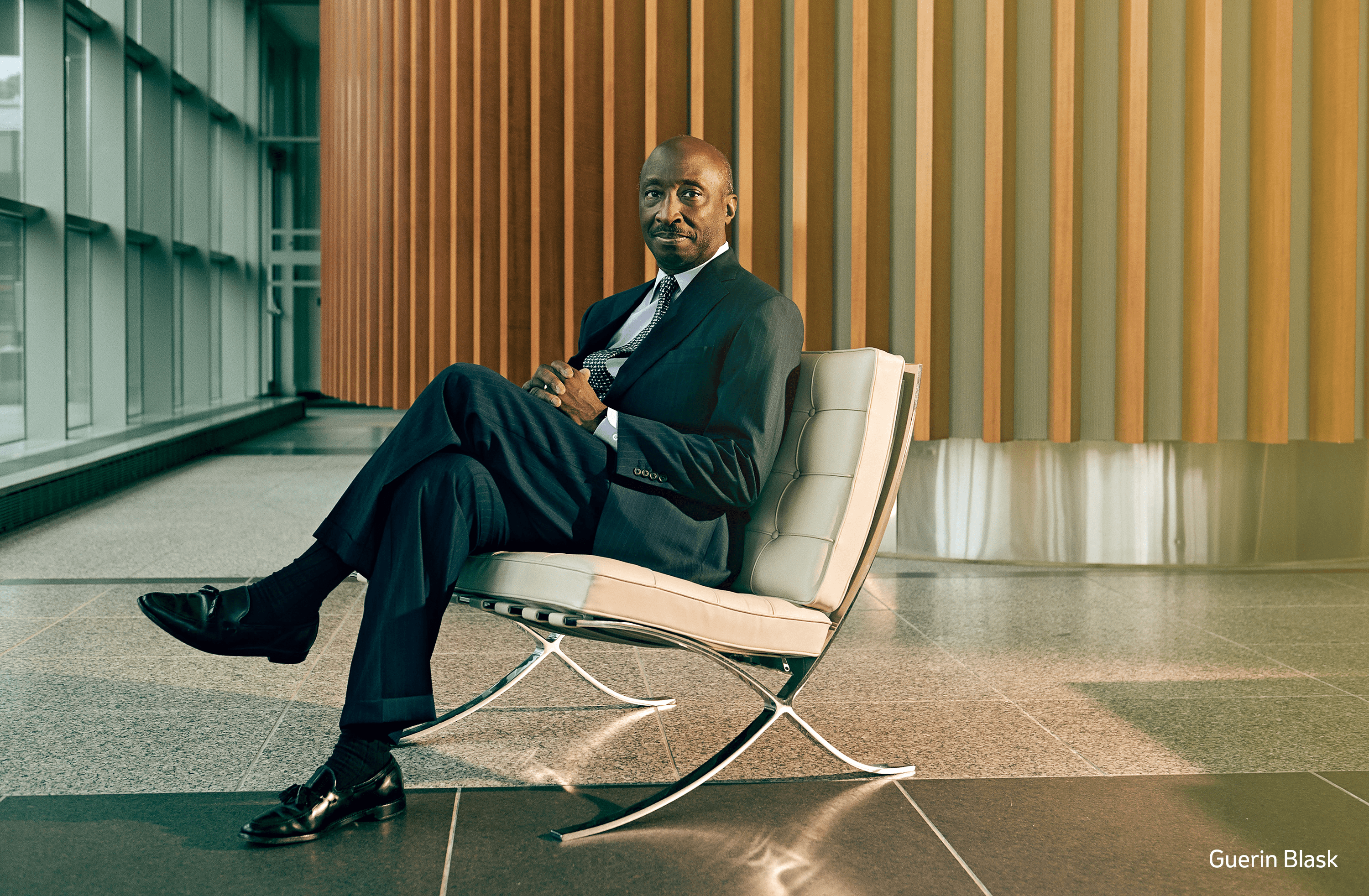 Ken Frazier sitting in a chair