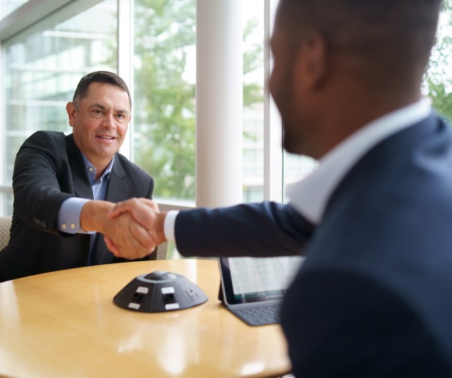 two men shaking hands