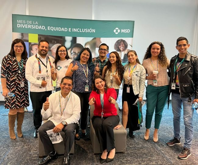 Employees pose for group photo