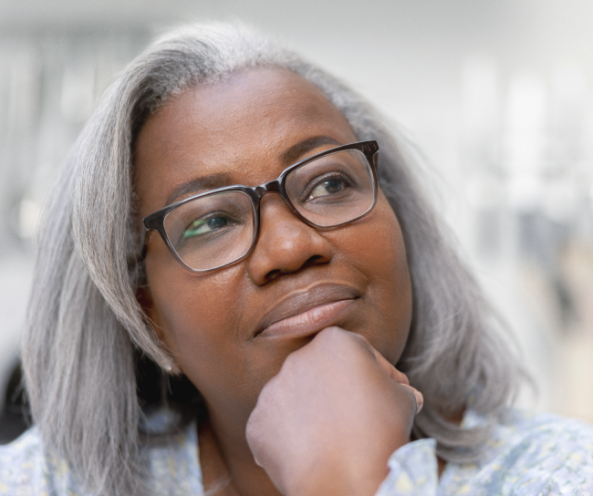 Woman with glases ponders