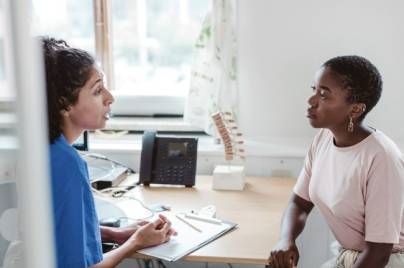 Patient listens intently to doctor
