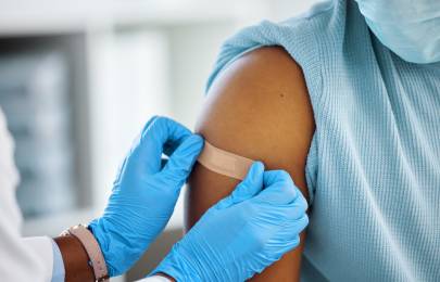 bandaid being applied to arm