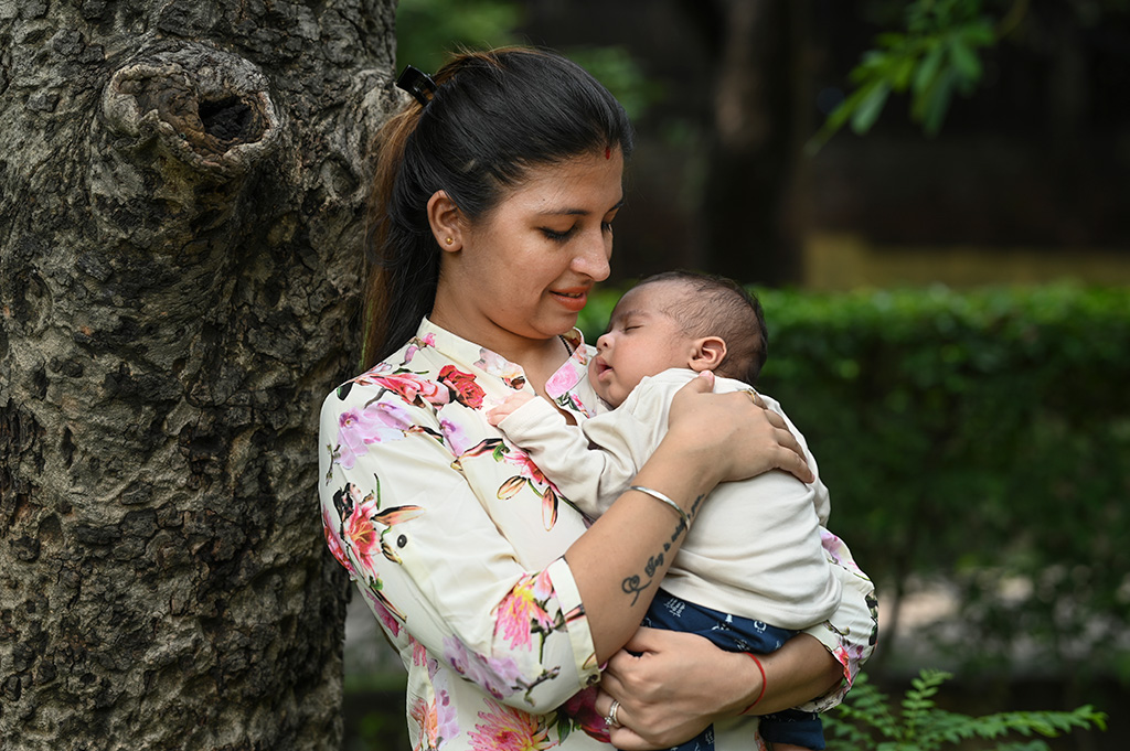 woman holding baby