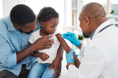 child receiving vaccination