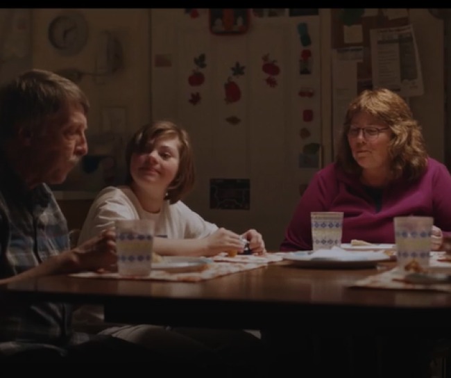 Family sitting at table