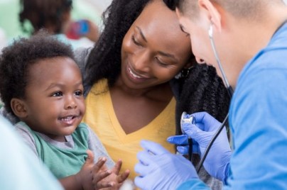 health care provider with child patient