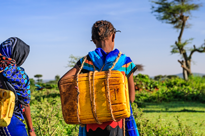 Young girls carrying water