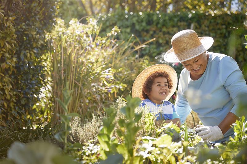 woman-and-child-in-field-of-flowers