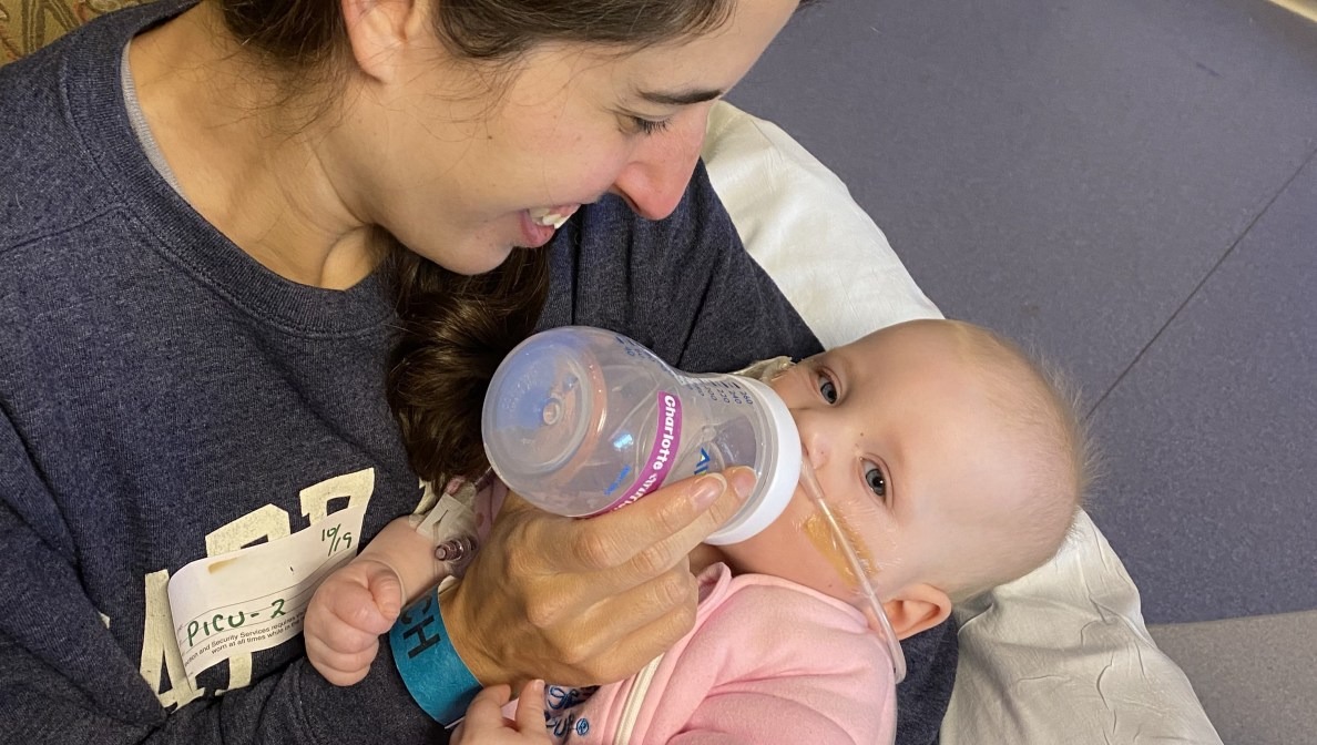 Amanda holding her baby Charlotte