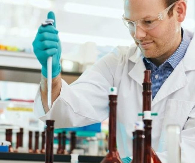 Scientist measuring