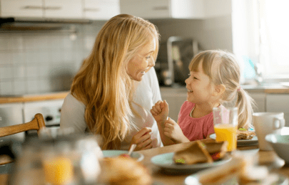 Parent and child at breakfast