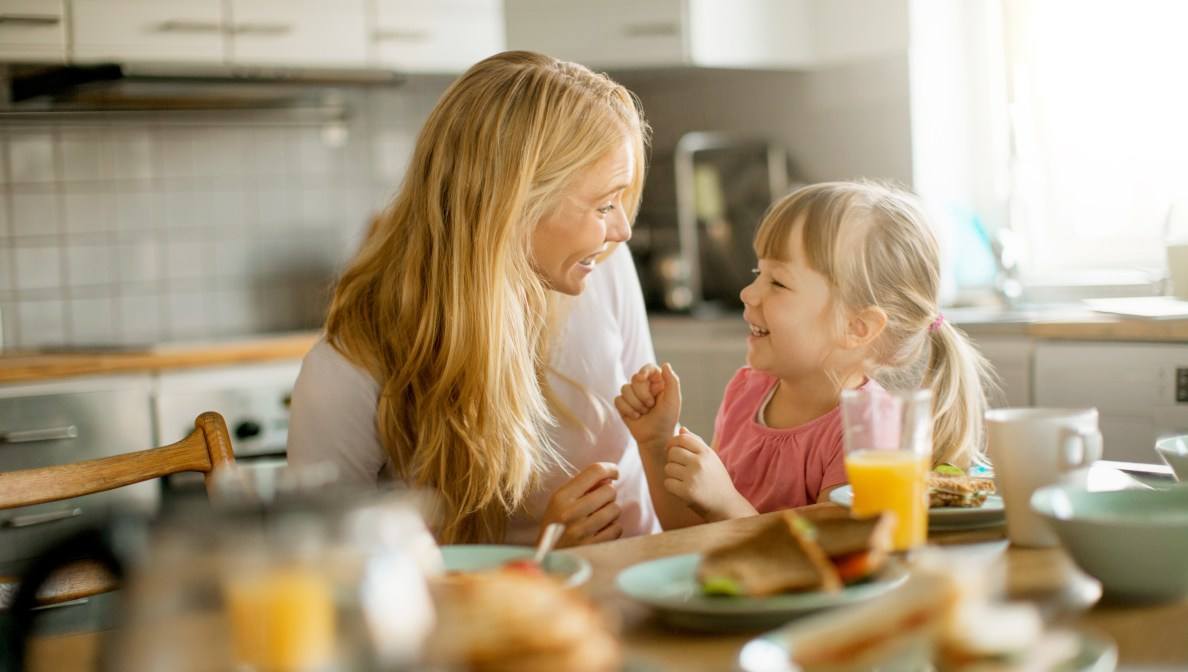 Parent and child at breakfast