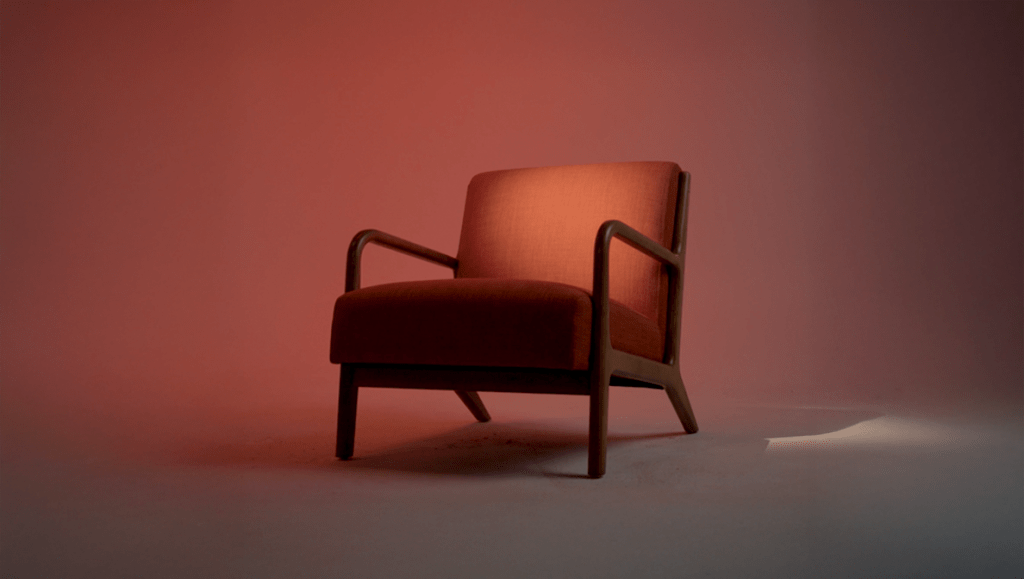 image of a red chair with a soft light shining on it