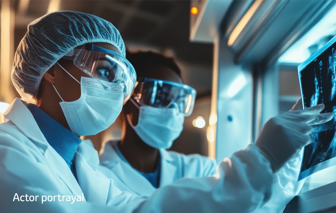 scientists examining at x-rays