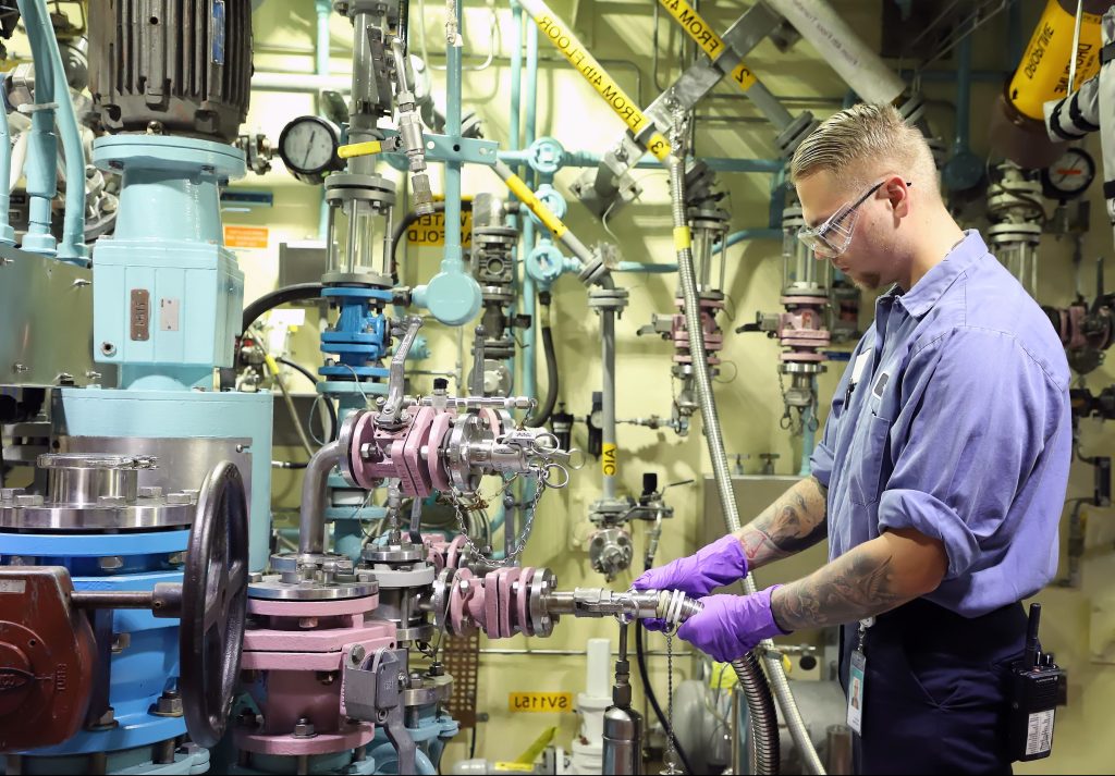 employee working in manufacturing facility 