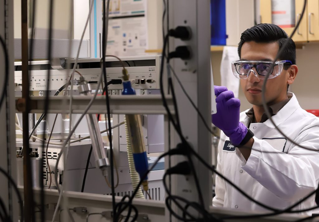 employee operating manufacturing machinery