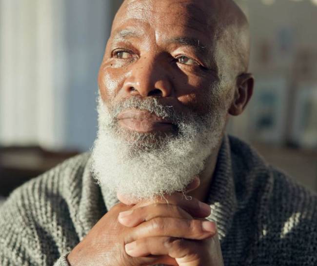 close up of man gazing to his right