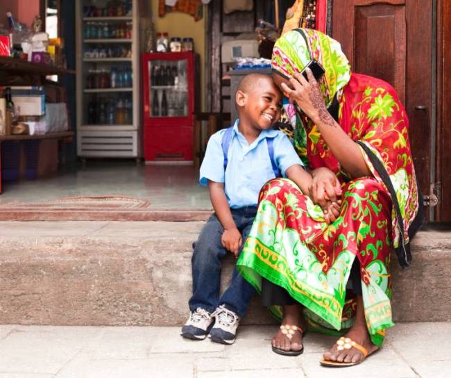 parent and child-on phone in-East African market