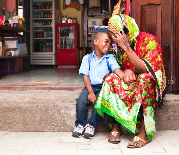 parent and child-on phone in-East African market
