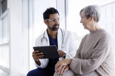 Doctor consulting patient